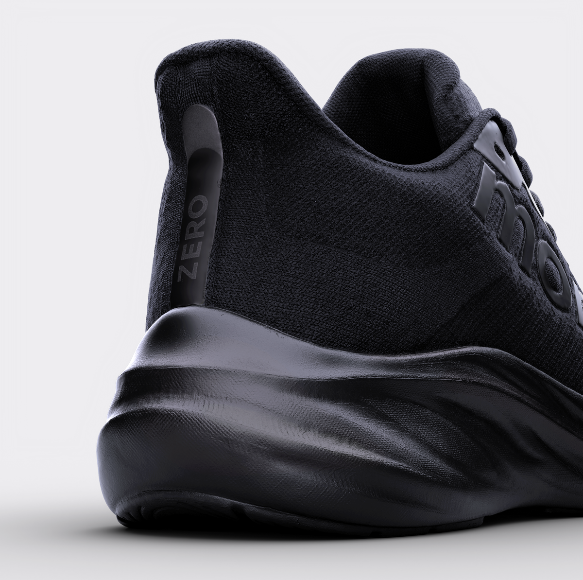 Zapatillas running Zero Haus – vista posterior, contrafuerte estabilizador y logo Monk