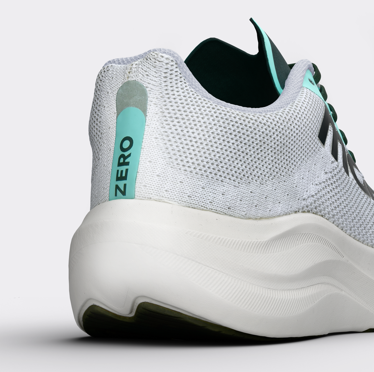 Zapatillas running Zero Minted Ice – vista posterior, contrafuerte y logo Monk Performance