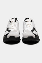 Zapatillas Monk Zero Moonlight – vista frontal, placa estabilizadora