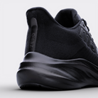 Zapatillas running Zero Haus – vista posterior, contrafuerte estabilizador y logo Monk