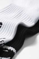 Detalle calcetines running U8 Monk Performance – banda de compresión en empeine